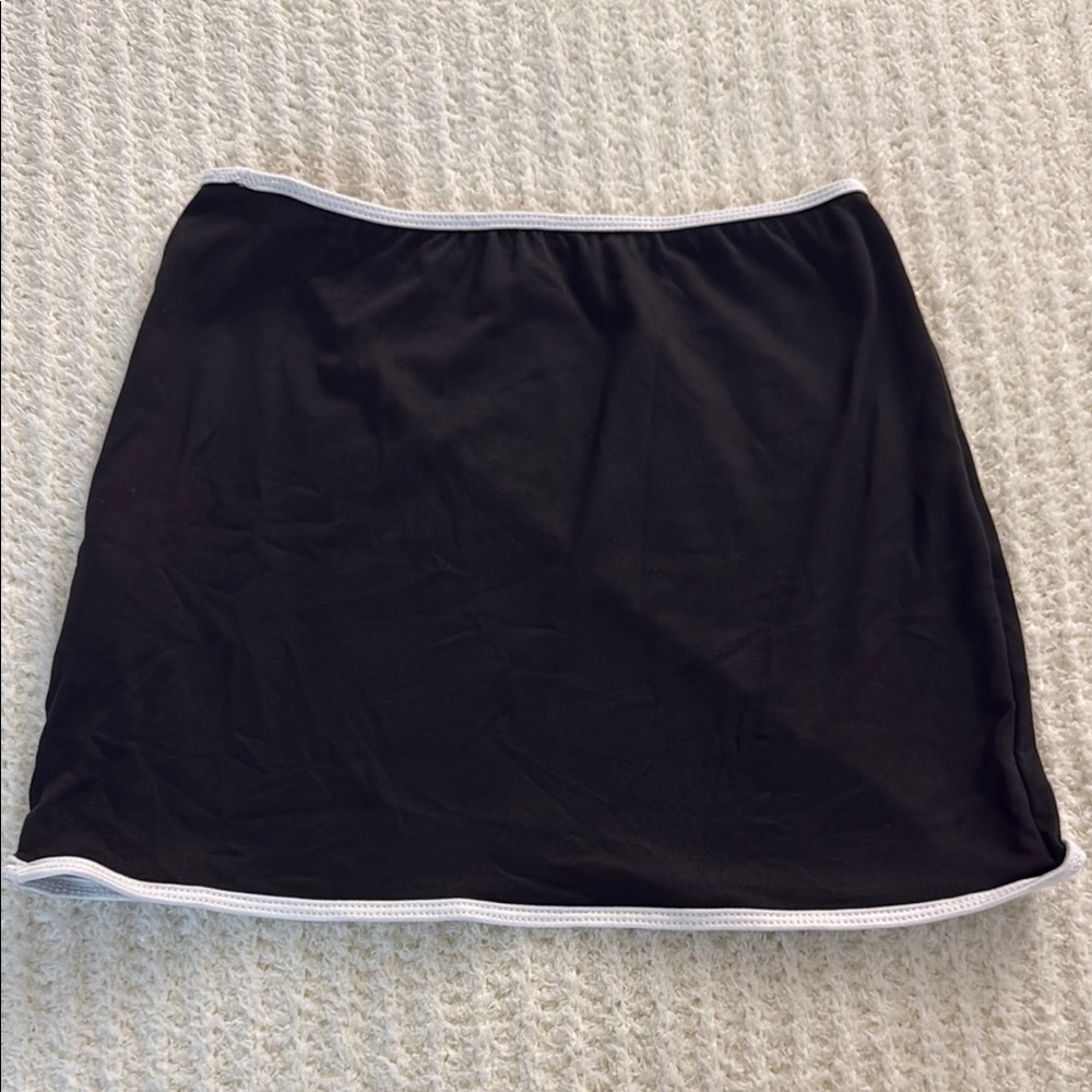 Chic Black Mini Skirt with Elegant White Trim